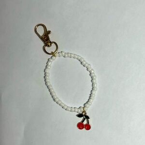 Cute cherry keychain that is great for purses and backpacks